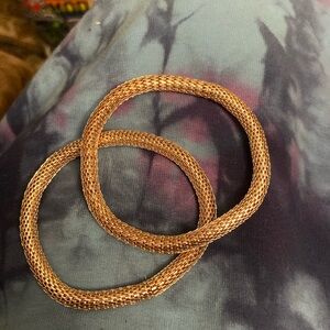 2 Rose gold colored bracelets